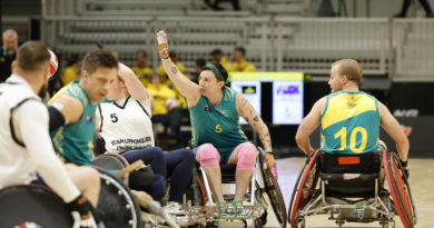 Major Liz Daly competes for the ball during the wheelchair rugby competition at Invictus Games Vancouver Whistler 2025. Story by Flying Officer Belinda Barker. Photo by WOFF Ricky Fuller.