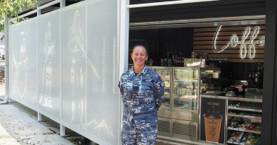 RAAF Base Amberley senior ADF officer Wing Commander Tanya Evans at the newly refurbished Army and Air Force Canteen Service AP2 kiosk.
