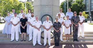 Military Public Affairs Officers gather at Russell Offices, Canberra, to celebrate Navy's newest employment category. No photographer credited (good start Navy).