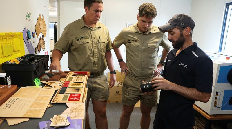 MakerSpace site supervisor Daniel Deleur shows Craftsmen Edward Viney and Dylan Mountain things people have made, during a site induction at the MakerSpace on Robertson Barracks. Story and photos by Warrant Officer Class 2 Max Bree.