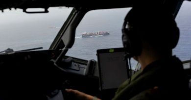 Royal Australian Navy pilot Lieutenant Jure Plestina observes a vessel from a Royal Australian Air Force P-8A Poseidon aircraft during a coordinated maritime domain awareness activity in the South China Sea. Story by Flight Lieutenant Imogen Lunny. Photos: byCorporal Emma Schwenke.