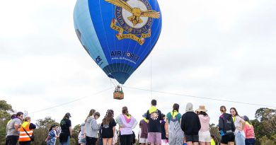 Families at the Very Special Kids Camp line up for their flight in the Air Force Balloon. Story by Flying Officer Rose Gigliotti. Photos by Leading Aircraftwoman Paris Rigney.