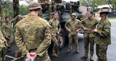 Members of 6 Battalion, Royal Australian Regiment meet Commander 11 Brigade, Brigadier Richard Peace, at Redlands City Council Local Government Area while supporting the local community affected by Ex Tropical Cyclone Alfred. Story by Captain Cath Batch. Photo by Ed Cousins.