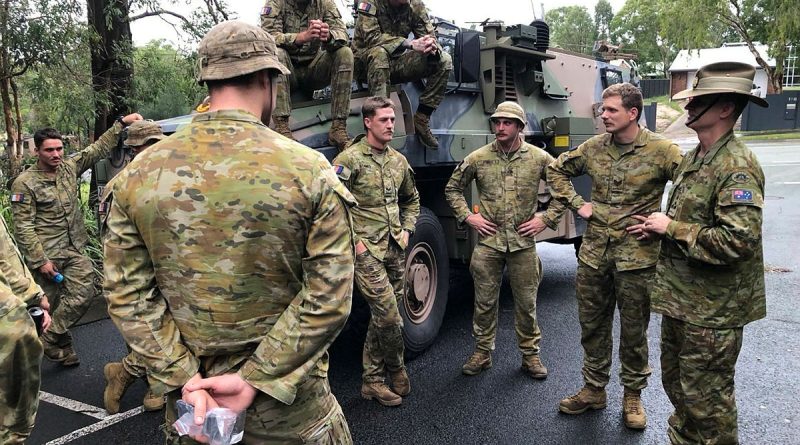 Members of 6 Battalion, Royal Australian Regiment meet Commander 11 Brigade, Brigadier Richard Peace, at Redlands City Council Local Government Area while supporting the local community affected by Ex Tropical Cyclone Alfred. Story by Captain Cath Batch. Photo by Ed Cousins.