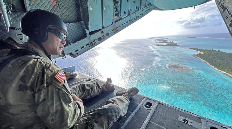 US Army personnel on the ramp of a RAAF C-27J Spartan overlook Kwajalein Atoll. Story by Flight Lieutenant Glen Paul. Photos by Sherman Hogue.