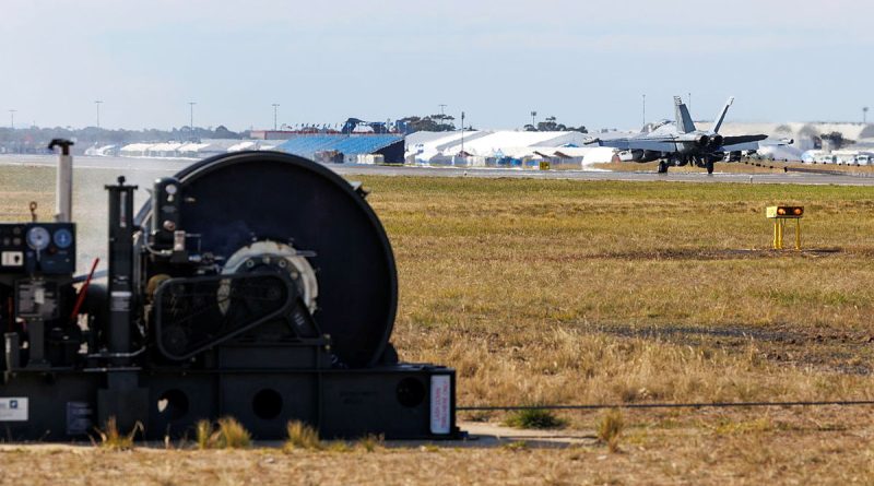 A No.6 Squadron EA-18G Growler conducts a proof of arrest using the tactical aircraft arrestor system during the Australian International Air Show 2025, at Avalon Airport. Story b y Flight Lieutenant Kayla Walliss. Photos by Leading Aircraftman Ryan Howell.