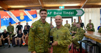 Australian Army officer Brigadier Damian Hill presents Lance Bombardier Joshua Burke with an engraved watch in recognition of the Mattner Award. Story by Major Tim Sydenham. Photo by Signals Aaron Thant.