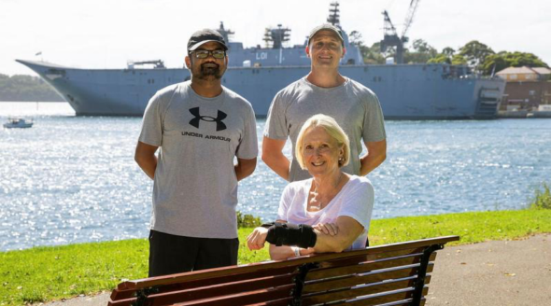 Able Seaman Bharatkumar (Brett) Thumar, left, and Leading Seaman Chris Hughes reunite with Liz Cummings for the first time since providing first aid to her in the Royal Botanic Garden, Sydney. Story by Lieutenant Allan Bruty. Photo by Petty Officer James Whittle.