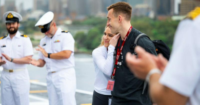Elinor Thomas and Thomas Watkins, centre, thank HMAS Canberra personnel for saving Mr Watkins' life, and receive a tour of the ship while alongside Fleet Base East in Sydney. Story by Lieutenant Marcus Middleton. Photos by Leading Seaman Daniel Goodman.