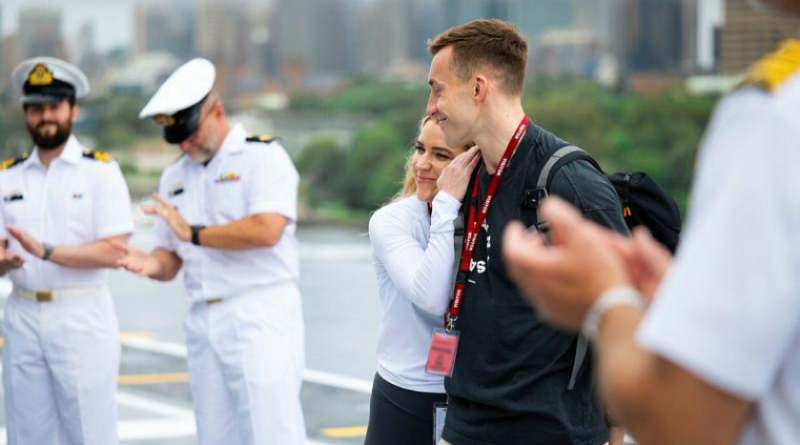 Elinor Thomas and Thomas Watkins, centre, thank HMAS Canberra personnel for saving Mr Watkins' life, and receive a tour of the ship while alongside Fleet Base East in Sydney. Story by Lieutenant Marcus Middleton. Photos by Leading Seaman Daniel Goodman.