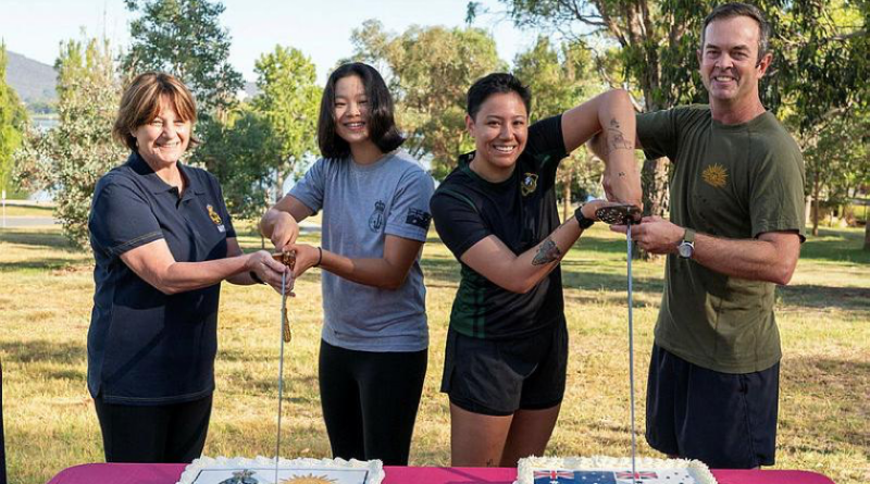 From left, Rear Admiral Letitia Van Stralen, Seaman Deborah Kwon, Private Danielle Collier and Brigadier Jason Groat cut the cakes to celebrate the 124th birthday of Navy and Army.