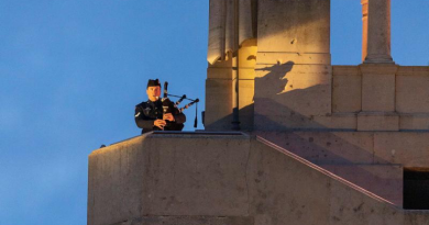 RAAF musician Corporal Robert Scott plays the bagpipes during the Anzac Day dawn service in Villers-Bretonneux, France. Story by Flight Sergeant Vicki Shelley. Photo by Corporal Robert Whitmore.