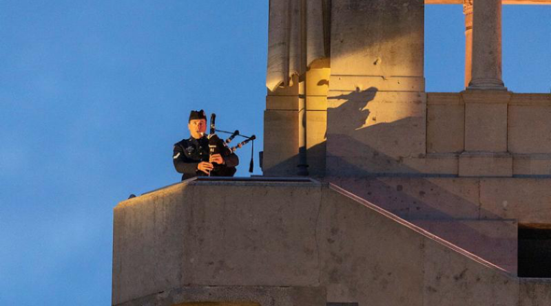 RAAF musician Corporal Robert Scott plays the bagpipes during the Anzac Day dawn service in Villers-Bretonneux, France. Story by Flight Sergeant Vicki Shelley. Photo by Corporal Robert Whitmore.