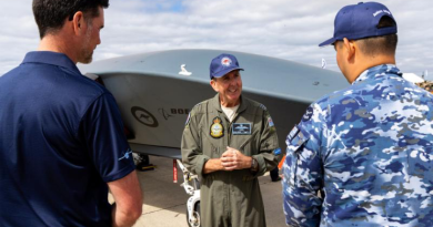 Wing Commander Phil Parsons, from the Collaborative Autonomous Systems Project Office, speaks with aviators and representatives from Boeing about the capabilities of the Boeing MQ-28 at the Australian International Airshow 2025. Story by Flight Lieutenant Sharon Sebastian. Photo by Leading Aircraftman Campbell Latch.