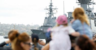 Families prepare to welcome HMAS Hobart back to Fleet Base East in Sydney after three months on deployment. Photo by Able Seaman Lauren Pugsley.