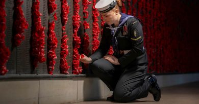 Able Seaman Rachel Brandt, of Australia's Federation Guard, places a poppy to mark her respects at the Australian War Memorial during the lead-up to Anzac Day 2025. Story by Flight Lieutenant Vernon Pather. Photos by Sergeant Sagi Biderman.