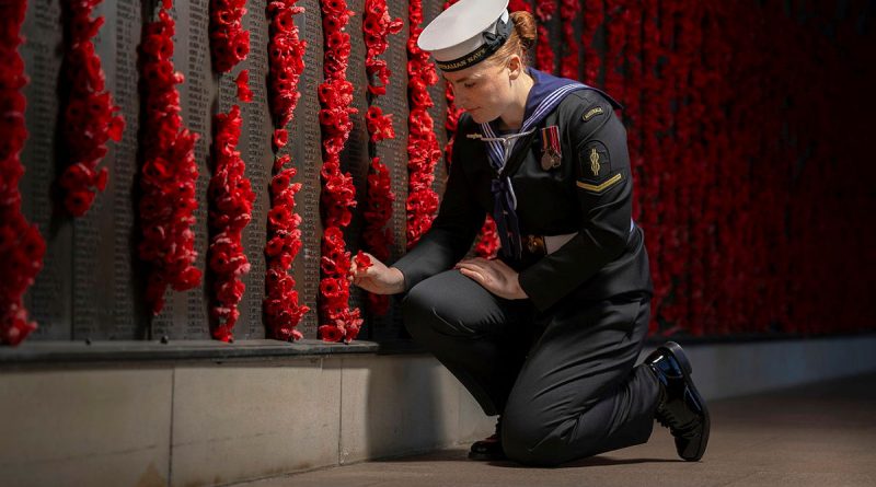 Able Seaman Rachel Brandt, of Australia's Federation Guard, places a poppy to mark her respects at the Australian War Memorial during the lead-up to Anzac Day 2025. Story by Flight Lieutenant Vernon Pather. Photos by Sergeant Sagi Biderman.