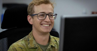 Royal Australian Air Force officer Flight Lieutenant Zac Pattison at his computer while deployed on Operation Accordion at Headquarters Middle East in 2025. Story and photo by Corporal Luke Bellman.