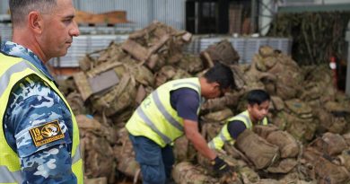 Sergeant Paul Scandura of 19 Squadron oversees locally engaged civilians constructing aircraft pallets to support a Rifle Company Butterworth (RCB) rotation. Photo by Flight Lieutenant Michael Gosney.