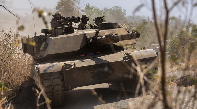 Australian Army soldiers from the 1st Armoured Regiment conduct manoeuvre training on an M1A1 Abrams Main Battle Tank in Puslatpur, Indonesia during Exercise Super Garuda Shield 2023. Photo by Corporal Dustin Anderson.
