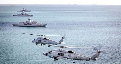 Two MH-60R Seahawk helicopters circle HMAS Warramunga, HMAS Stuart and HMAS Toowoomba as the ships prepare for ASWEX 25. Photo by Leading Seaman Iggy Roberts.