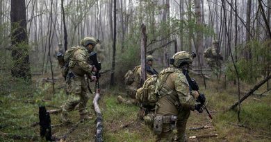 Army soldiers from 1st/15th Royal New South Wales Lancers patrol through bush at Holsworthy, NSW, during Exercise Menin Run. Story by Captain Tim Klingner. Photos by Corporal Jarrod Moreels.