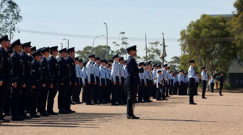 Participants in the Officers' Training School 75th anniversary parade stand to attention. Story by Flying Officer Shanea Zeegers. Photos by Leading Aircraftwoman Laura Flower.