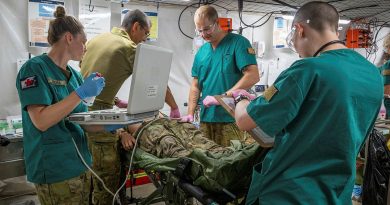 Medical staff from 3rd Health Battalion treat a simulated casualty during rehearsals as part of Exercise Balikatan in Palawan, Philippines. Story by Lieutenant Emily Tinker. Photos by Leading Seaman Kylie Jagiello.