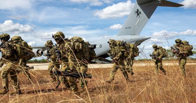 Australian Army soldiers from the 7th Brigade's Battle Group Heeler exit a RAAF C-17A Globemaster III at Nackeroo Airfield as part of Exercise Global Dexterity 25. Story and photos by Corporal Michael Rogers.