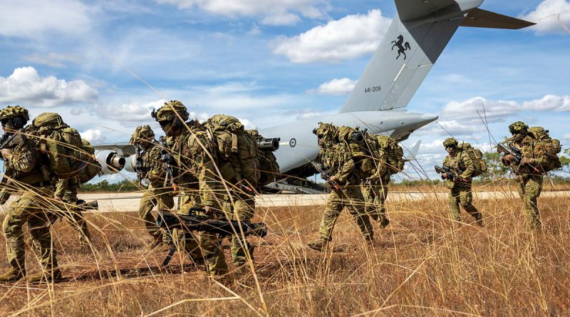 Australian Army soldiers from the 7th Brigade's Battle Group Heeler exit a RAAF C-17A Globemaster III at Nackeroo Airfield as part of Exercise Global Dexterity 25. Story and photos by Corporal Michael Rogers.