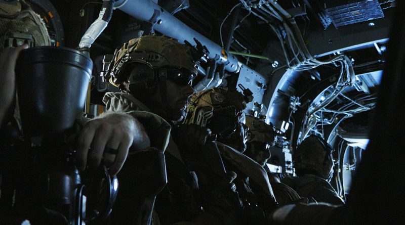 Australian Army soldiers from 5th/7th Battalion, the Royal Australian Regiment, transit to Balabac Island, Philippines, on an American Bell Boeing V-22 Osprey, as part of Exercise Balikatan. Story by Lieutenant Emily Tinker. Photo by Sergeant Samuel Miller.