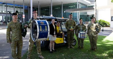 Soldiers of the 3rd Battalion, the Royal Australian Regiment, present a donation to Brighter Lives at Townsville University Hospital, Queensland. Photos by Lance Corporal Caitlyn Davill.