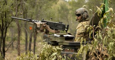 A soldier from the 2nd Cavalry Regiment stands in his Australian Light Armoured Vehicle before a live-fire serial in the Townsville Field Training Area during Exercise Eagle March. Story and photos by Sergeant Matthew Bickerton.