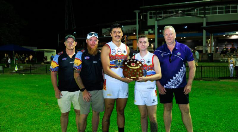 The NT ADF men's team holds the 2025 Anzac Shield with Commander 1st Brigade, Brigadier Doug Pashley, and Assistant Commissioner Matthew Hollamby, of the NT Police, Fire & Emergency Services, at TIO Stadium 2, Darwin. Story by Captain Nicholas Marquis. Photos by Corporal Madhur Chitnis.