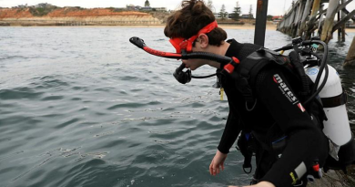 Patrick Killen enters the water from Port Noarlunga Jetty as part of the Veterans Dive Initiative open water course. Story and photos by Captain Peter March.