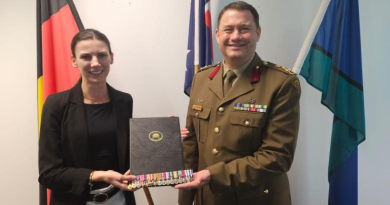 Deputy Surgeon General ADF and Head of the Royal Australian Army Medical Corps, Brigadier Isaac Seidl, presents Sir ‘Weary’ Dunlop’s granddaughter, Diana, with a set of miniature medals. Story by Michael Hoare.