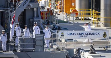 Commanding Officer HMAS Cape Schanck Lieutenant Commander Christopher Wardle is piped across the gangway for the first time during a Commissioning ceremony held at HMAS Coonawarra, Darwin, Northern Territory. Photo by Petty Officer Leo Baumgartner.