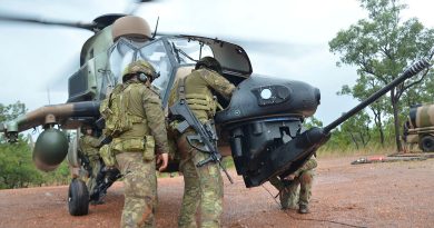 Army forward arming and refuelling point operators, of 1st Aviation Regiment, carry out a weapon clearance drill on an ARH Tiger during Exercise Griffin Walk. Story and photos by Captain Tadek Markowski.