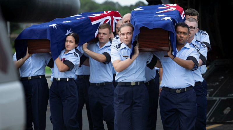 Royal Australian Air Force personnel from Australia's Federation Guard and 100 Squadron carry the caskets of Warrant Officer Russell Grigg and Warrant Officer Clement Wiggins in Port Moresby, PNG. Story by Squadron Leader Karyn Markwell. Photos by Leading Aircraftwoman Aiesha Katz-White.