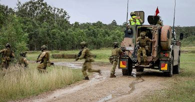 Aviators from 2 Security Forces Squadron disembark from a Bushmaster during a live-fire section attack activity as part of Exercise Crack Thump 3 at Singleton Military Area. Photos by Corporal Michael Rogers.