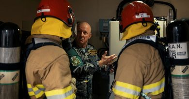 Members of HMAS Canberra's Standing Sea Fire and Emergency Party conduct damage control training with Chief Petty Officer Andrew Gibson from Sea Training Group during a transit to Wellington, New Zealand. Story by Lieutenant Michael Wilson. Photos by Petty Officer Jarrod Mulvihill.