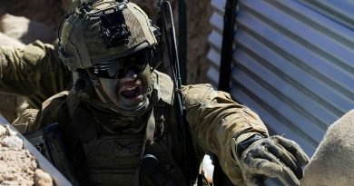 An Australian Army soldier from the 1st Battalion, The Royal Australian Regiment, delivers orders during a blank fire trench serial at Townsville Field Training Area. Story by Corporal Michael Rogers. Photo by Lance Corporal Caitlyn Davill.