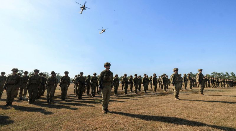 Soldiers of the 5th/7th Battalion, Royal Australian Regiment, on parade with Army reconnaisance helicopters from 1st Aviation Regiment during the Battle of Binh Ba commemoration service held in Darwin. Story by Captain Nicholas Marquis. Photo by Corporal Madhur Chitnis.