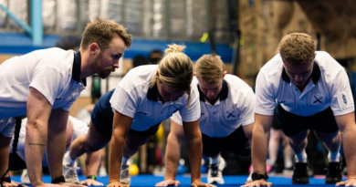Royal Australian Navy physical training instructors participate in the Push-Up Challenge at Fleet Base East Gymnasium in Sydney, NSW. Story by Amy Seedsman. Photo by Leading Seaman Daniel Goodman.