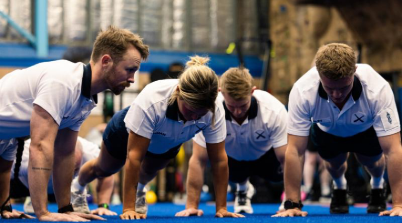Royal Australian Navy physical training instructors participate in the Push-Up Challenge at Fleet Base East Gymnasium in Sydney, NSW. Story by Amy Seedsman. Photo by Leading Seaman Daniel Goodman.
