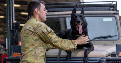 Lance Corporal Jared Willis with his military working dog Dirk at Roberston Barracks in Darwin. Story by Leading Seaman Nadav Harel. Photo by Corporal Gregory Scott.