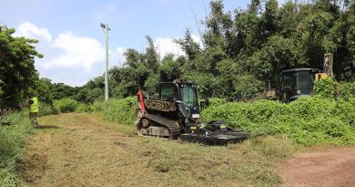 Army engineers from 6th Engineer Support Regiment clear the ground with a JCB Skid Steer Loader for the Army Ailan Community Assistance Program. Story and photos by Captain Joanne Leca.