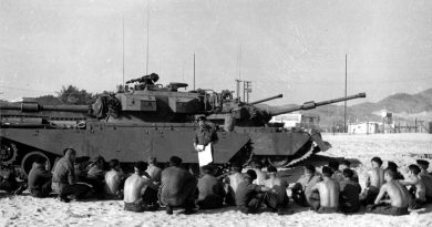 Soldiers of the 1st Armoured Regiment are briefed while sitting in front of their Centurion tanks at Vung Tau in South Vietnam during 1968. Photo by Starry, Donn A. Mounted combat in Vietnam. Department of the Army, via Wikipedia.