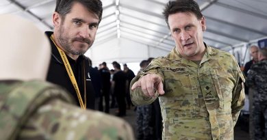 Head of Military Strategic Plans Major General Colin Karotam talks with defence industry professionals during Exercise Autonomous Warrior 2022 at HMAS Creswell, Jervis Bay, Australian Capital Territory. Photo by Leading Seaman Ryan Tascas.
