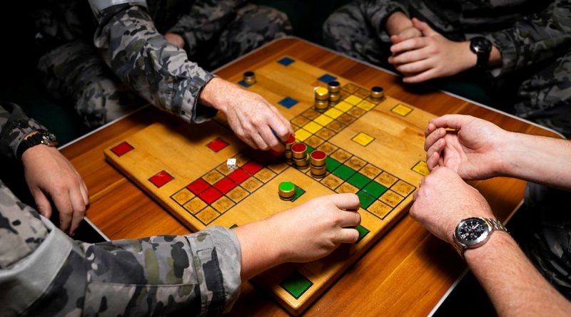 For the crew of HMAS Sydney, Uckers is a traditional game that parallels the journey of the ship during its regional presence deployment. Story by Lieutenant Hinako Shiraishi. Photos by Leading Seaman David Cox.